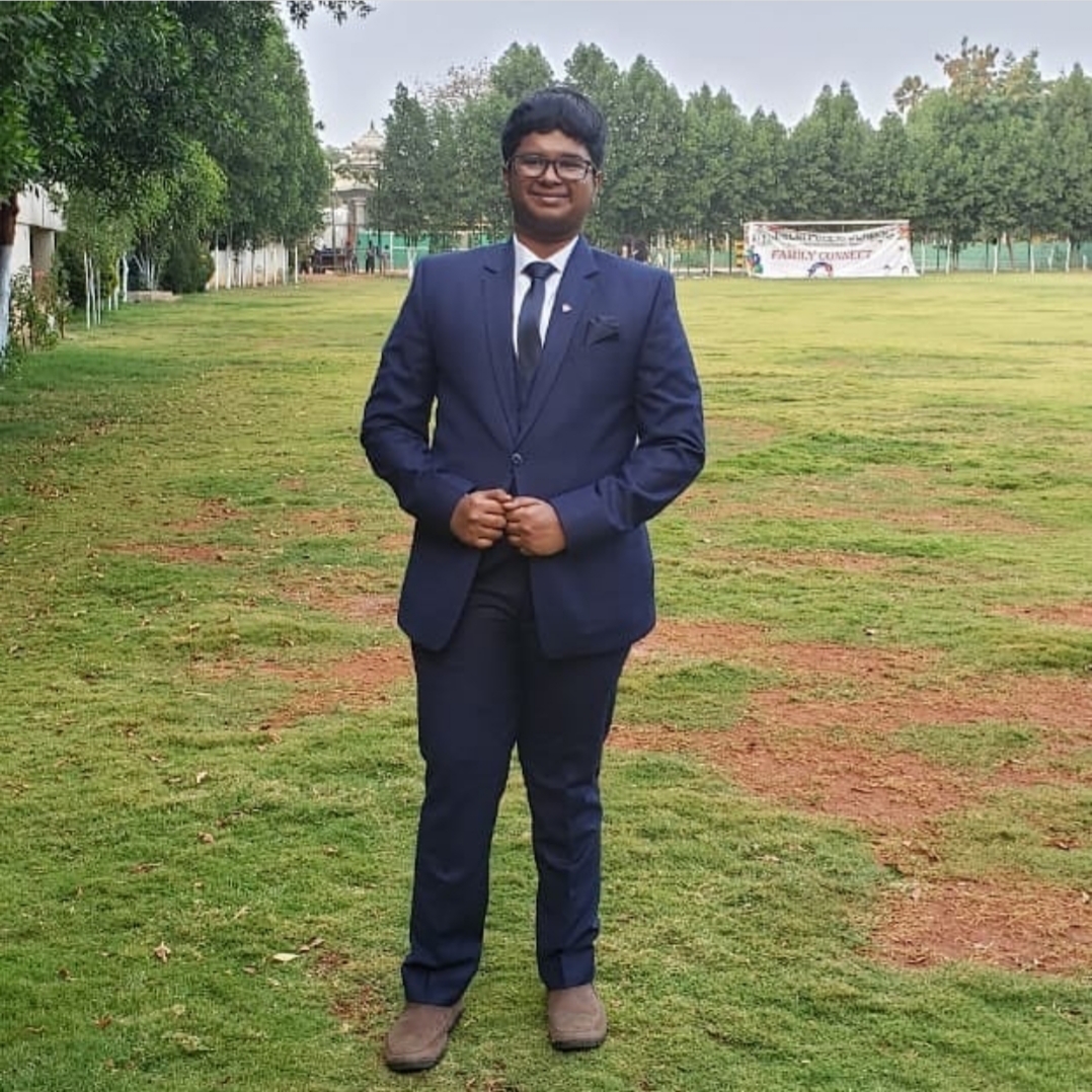 Advaith standing in a field