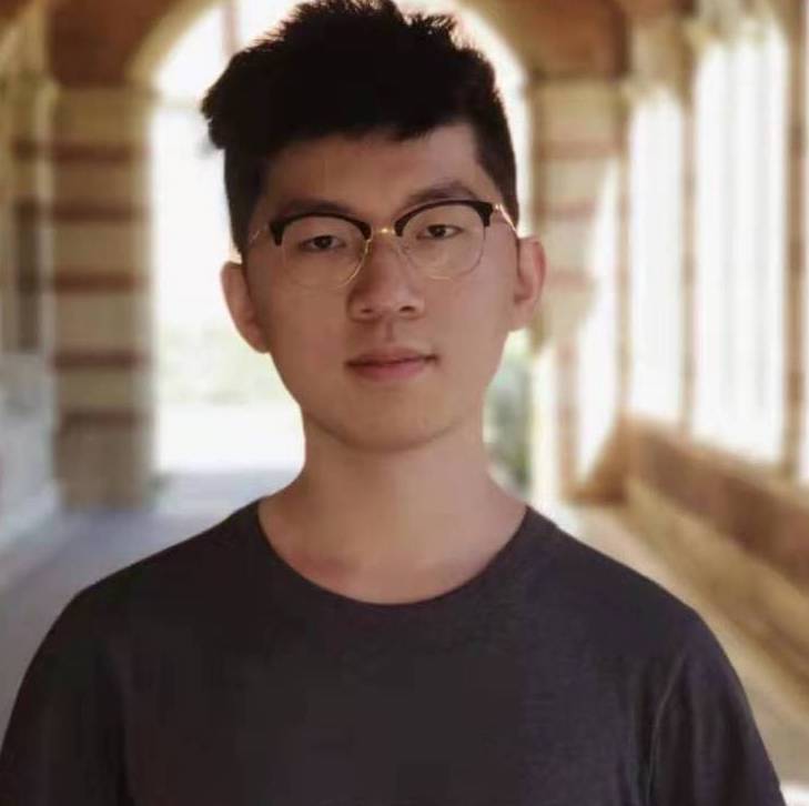 Tristan standing in a corridor